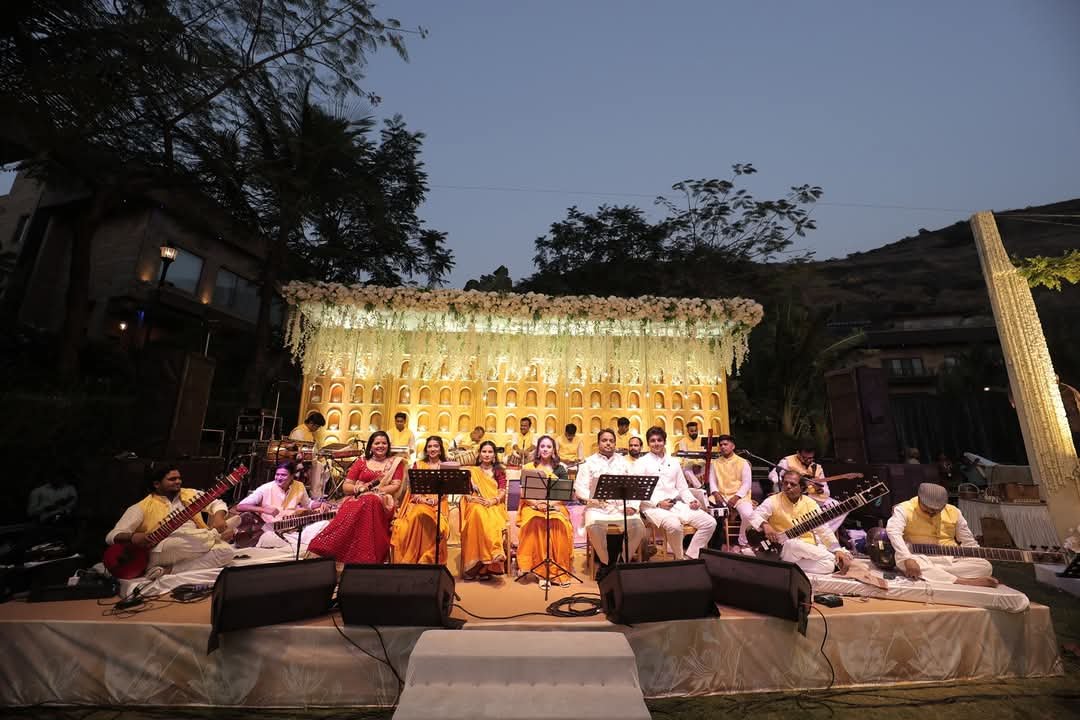 Wedding stage with sitar orchestra at dusk