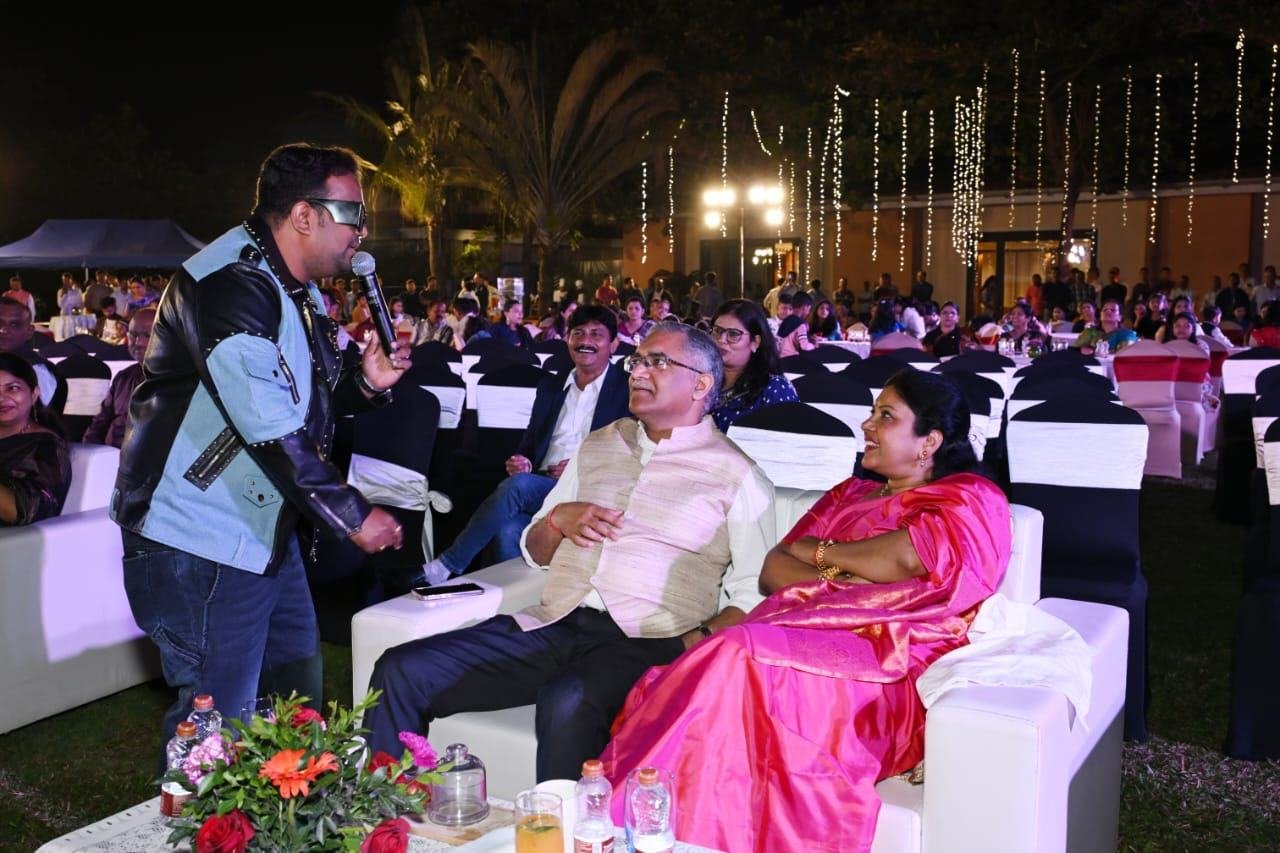 Vaibhav Pewal performing among the audience at an outdoor evening show